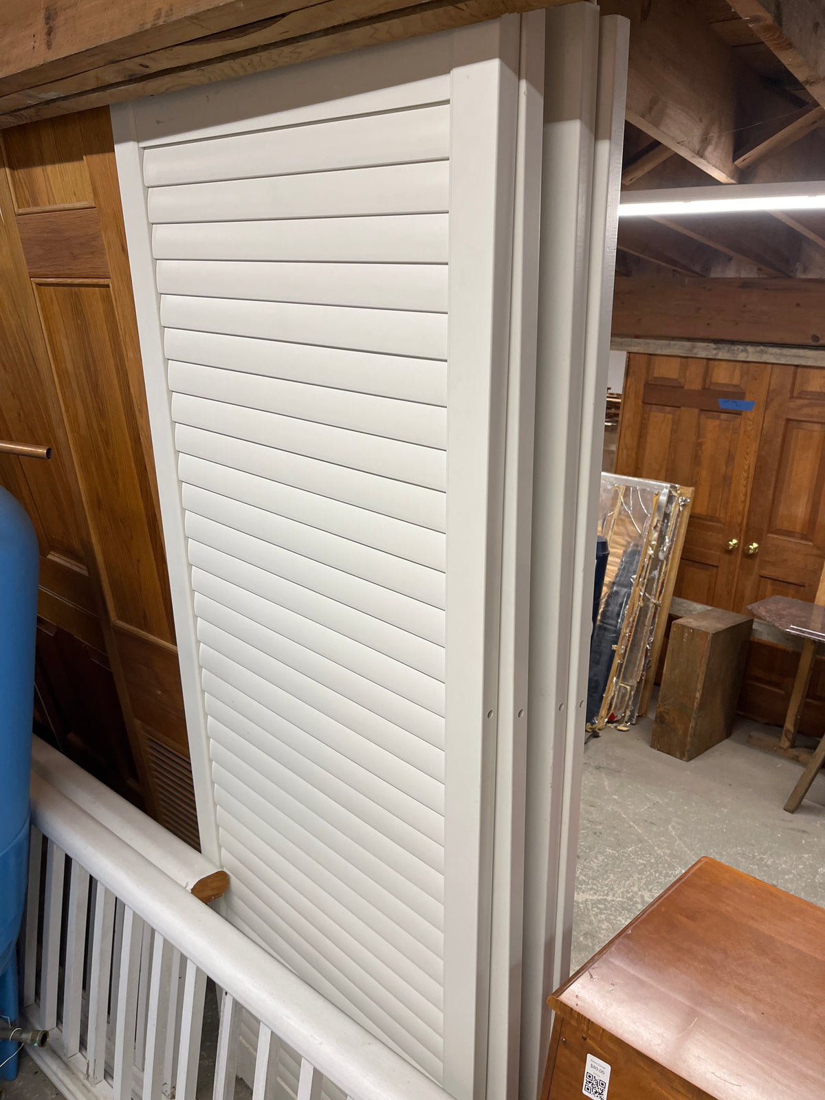 24” vinyl sliding louvered doors